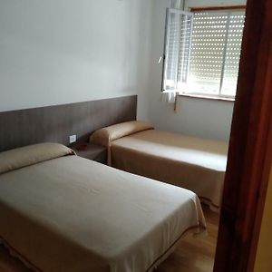 Habitación con 2 Camas Individuales